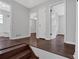 View from stairs to second level showing entry to multiple rooms and bathroom at 1520 Oxford St, Douglasville, GA 30134