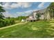 Well maintained lawn with fenced perimeter and deck at 780 Old Magnolia Trl, Canton, GA 30115