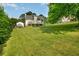 Spacious grassy backyard with deck at 780 Old Magnolia Trl, Canton, GA 30115
