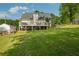 Spacious lawn with deck, shed, and partial fence at 780 Old Magnolia Trl, Canton, GA 30115