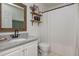 Elegant half-bath features granite counters, modern fixtures, decorative shelves and towel rack at 780 Old Magnolia Trl, Canton, GA 30115