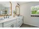 Bright bathroom features dual sinks, granite countertops, modern fixtures, and a glass shower at 780 Old Magnolia Trl, Canton, GA 30115