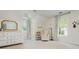 Bright Bedroom features a rocker, dresser, and decorative tree at 780 Old Magnolia Trl, Canton, GA 30115