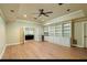 Spacious finished basement featuring hardwood floors, built-in shelving, and a separate seating area at 1632 Brookhaven Close Ne, Atlanta, GA 30319