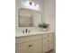 Bathroom featuring neutral colors, modern fixtures, and a large mirror at 1632 Brookhaven Close Ne, Atlanta, GA 30319
