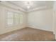 Bright and airy bedroom with plenty of space, neutral walls, and large windows at 1632 Brookhaven Close Ne, Atlanta, GA 30319