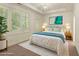 Well-lit bedroom with large windows, a comfortable bed, and neutral decor at 1632 Brookhaven Close Ne, Atlanta, GA 30319