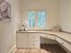 Home office features built in desk, ample storage, and a bright window at 1632 Brookhaven Close Ne, Atlanta, GA 30319