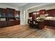 Spacious eat-in kitchen with hardwood floors, custom cabinets and kitchen island at 1632 Brookhaven Close Ne, Atlanta, GA 30319