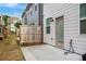 Backyard with gray siding, a concrete patio, and a wooden fence at 354 Hayden Cir, Woodstock, GA 30189