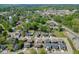 Neighborhood aerial view with a water tower in the background and the label Downtown Buford at 55 Sudderth St, Buford, GA 30518