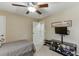 Bedroom features neutral walls, carpet, and a ceiling fan at 55 Sudderth St, Buford, GA 30518