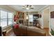Comfortable living room with a brick fireplace, hardwood floors, and neutral decor at 55 Sudderth St, Buford, GA 30518