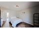 Bedroom featuring a glimpse into the en suite bathroom, plus modern shelving at 8451 Magnolia Dr, Jonesboro, GA 30238