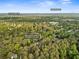 Aerial view of 10090 Feather Sound Ct, Alpharetta, GA 30022 near Old Alabama Rd, and Peachtree Corners at 10090 Feather Sound Ct, Alpharetta, GA 30022