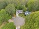 Aerial view of home in wooded cul-de-sac at 10090 Feather Sound Ct, Alpharetta, GA 30022
