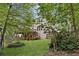 View of backyard and deck, a serene place for outdoor relaxation and entertainment at 10090 Feather Sound Ct, Alpharetta, GA 30022
