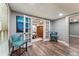 Basement flex space with wood-look floors and French doors at 10090 Feather Sound Ct, Alpharetta, GA 30022