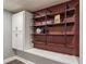 Basement bedroom with wood-look floors and built-in shelves at 10090 Feather Sound Ct, Alpharetta, GA 30022