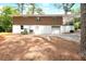 Exterior shot of the brick home with view of the garage at 1140 Starline Se Dr, Smyrna, GA 30080