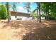 Exterior shot of the brick home with view of the garage at 1140 Starline Se Dr, Smyrna, GA 30080