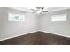 Bedroom with hardwood floors, ceiling fan and bright natural light at 1140 Starline Se Dr, Smyrna, GA 30080