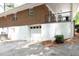 View of the lower level garage and brick elevation at 1140 Starline Se Dr, Smyrna, GA 30080
