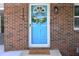 Close-up of front door with a wreath at 1140 Starline Se Dr, Smyrna, GA 30080