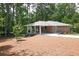 Charming brick home with well-manicured lawn and landscaping at 1140 Starline Se Dr, Smyrna, GA 30080