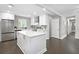 Spacious kitchen with stainless steel appliances, large center island, and modern finishes at 1140 Starline Se Dr, Smyrna, GA 30080