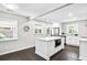 Modern kitchen with a large island, stainless steel appliances, and updated cabinets at 1140 Starline Se Dr, Smyrna, GA 30080