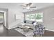 Bright living room with a comfortable couch, decorative pillows, and lots of natural light at 1140 Starline Se Dr, Smyrna, GA 30080