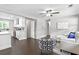 Open concept living space with modern decor, connecting to a well-equipped kitchen at 1140 Starline Se Dr, Smyrna, GA 30080