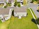 Spacious backyard with manicured lawn features a cozy patio, perfect for outdoor relaxation and entertainment at 1560 Avalon Creek Rd, Sugar Hill, GA 30518