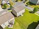 Backyard with a patio and lush lawn offers ample space for outdoor activities and relaxation at 1560 Avalon Creek Rd, Sugar Hill, GA 30518