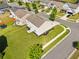 Well-kept lawn surrounds a home with a neat backyard, a patio, and tidy landscaping, offering a serene outdoor space at 1560 Avalon Creek Rd, Sugar Hill, GA 30518