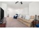 Upstairs bonus room with cozy seating, neutral carpet, and ample space at 1560 Avalon Creek Rd, Sugar Hill, GA 30518