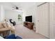 Cozy bonus room featuring neutral paint, closet, and entertainment area at 1560 Avalon Creek Rd, Sugar Hill, GA 30518
