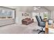 Large bonus room with carpeted floors, vaulted ceiling, ceiling fan and skylights at 5303 Davenport Mnr, Cumming, GA 30041