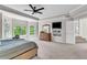 Spacious main bedroom boasts natural light, ceiling fan and built-in shelving at 5303 Davenport Mnr, Cumming, GA 30041