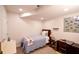 Small bedroom with a twin bed and a small desk at 110 Sandy Ridge Trl, Fayetteville, GA 30214