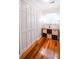 Hallway featuring hardwood floors and a closet for storage at 110 Sandy Ridge Trl, Fayetteville, GA 30214