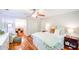 Relaxing main bedroom boasts gleaming hardwood floors, a sitting area, and a serene atmosphere at 110 Sandy Ridge Trl, Fayetteville, GA 30214