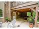 Inviting patio with a hot tub, seating, and string lights for cozy outdoor evenings at 110 Sandy Ridge Trl, Fayetteville, GA 30214