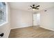 Spacious bedroom features new floors, fresh paint, a ceiling fan, and a walk in closet at 1225 Church St # A, Decatur, GA 30030