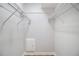 Bright walk-in closet with white wire shelving, new paint, and room for storage at 1225 Church St # A, Decatur, GA 30030