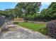 Relaxing community common area with lounge chairs, seating, and lush landscaping at 1225 Church St # A, Decatur, GA 30030