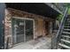 Brick apartment exterior with sliding glass door, private entrance and a cozy patio area at 1225 Church St # A, Decatur, GA 30030