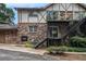 Well-maintained brick apartment building with Tudor accents, featuring balconies and staircases at 1225 Church St # A, Decatur, GA 30030