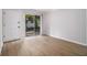 Living room features vinyl floors and a sliding glass door to a small outdoor area at 1225 Church St # A, Decatur, GA 30030